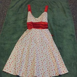 White with orange polka dot dress with tie